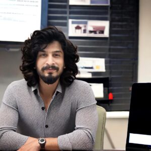 Nishant Dantare, Founder of gabbarinfo, sitting in a chair in office with folded hands